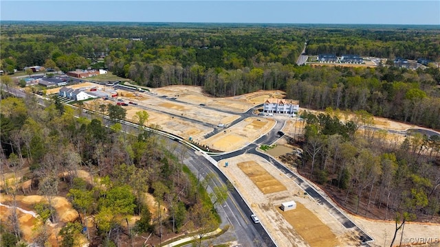 drone / aerial view with a forest view