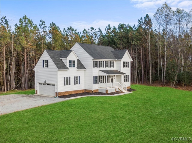 view of front of home featuring a shingled roof, an attached garage, a front lawn, and aphalt driveway