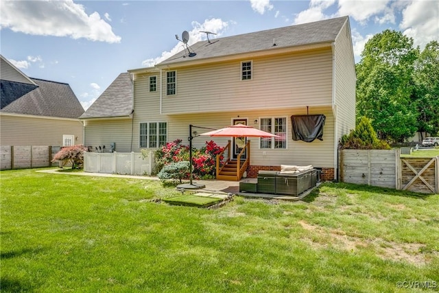rear view of house with an outdoor hangout area, a patio, a fenced backyard, and a lawn