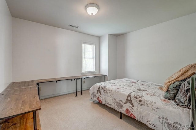 bedroom featuring carpet and visible vents