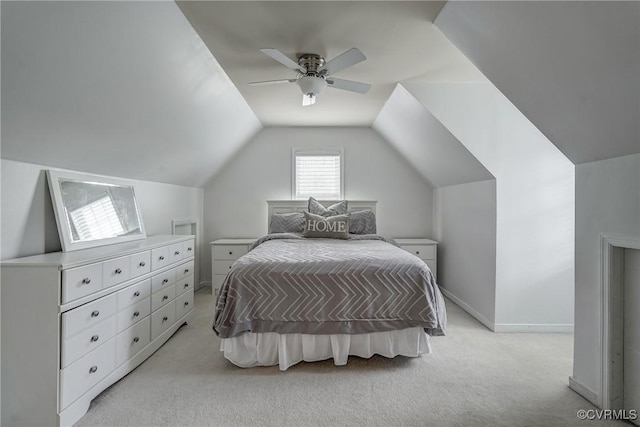 bedroom with light colored carpet, lofted ceiling, and ceiling fan
