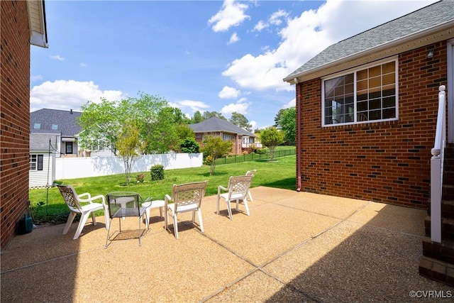 view of patio with fence