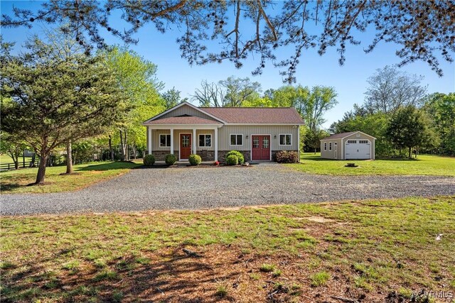 12421 Campbell Rd, Orange, VA 22960 - view of front of property featuring a porch, a front lawn, and an outbuilding