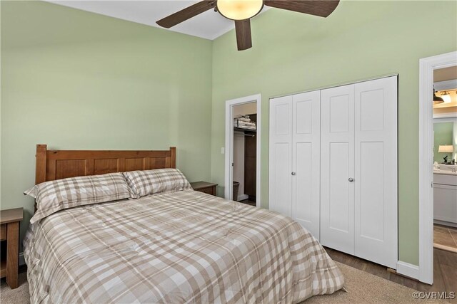 12421 Campbell Rd, Orange, VA 22960 - bedroom featuring ceiling fan, a towering ceiling, wood finished floors, a closet, and connected bathroom