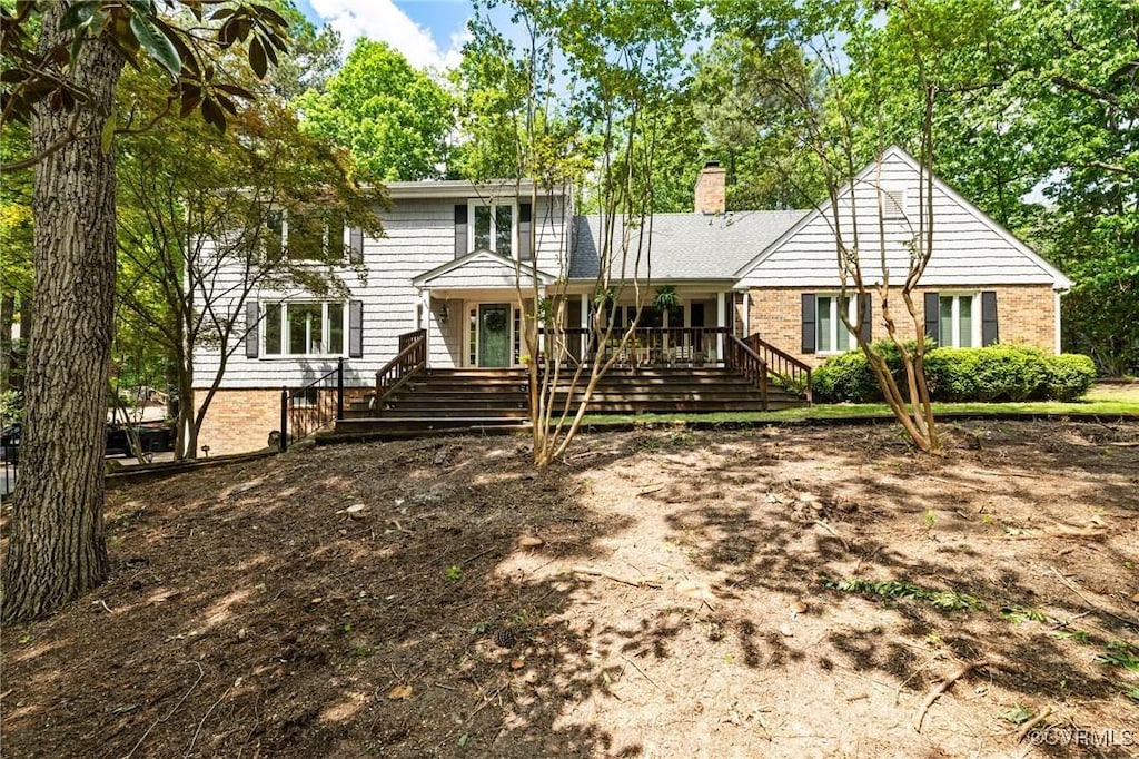 420 September Dr, Henrico, VA 23229 - view of front facade featuring brick siding and a chimney