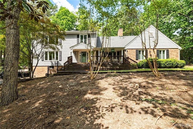 420 September Dr, Henrico, VA 23229 - view of front facade featuring brick siding and a chimney