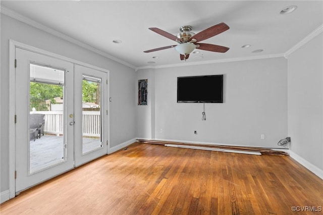 empty room featuring ornamental molding, wood finished floors, baseboards, a ceiling fan, and recessed lighting
