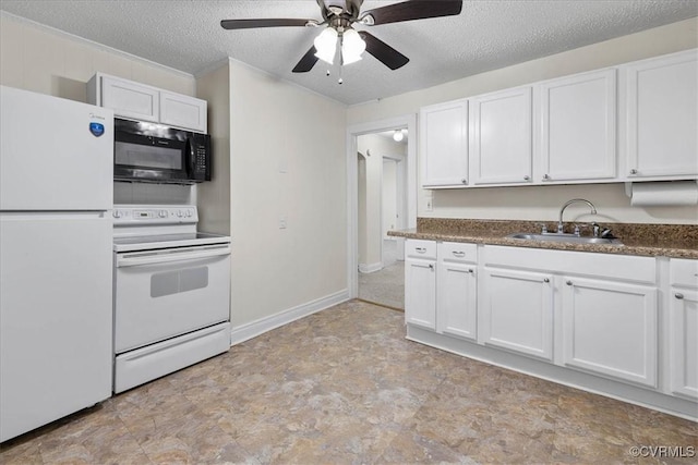 kitchen with white appliances, a ceiling fan, white cabinets, and a sink
