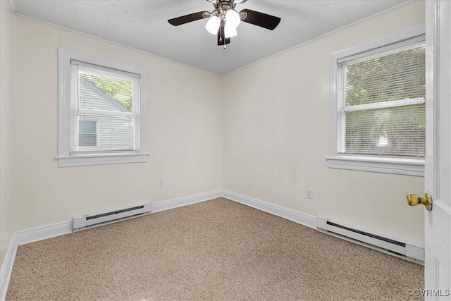 unfurnished room featuring carpet flooring, a textured ceiling, ceiling fan, and a baseboard heating unit
