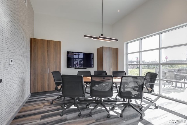 dining space with a high ceiling