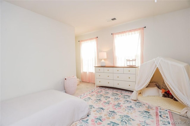 bedroom with visible vents