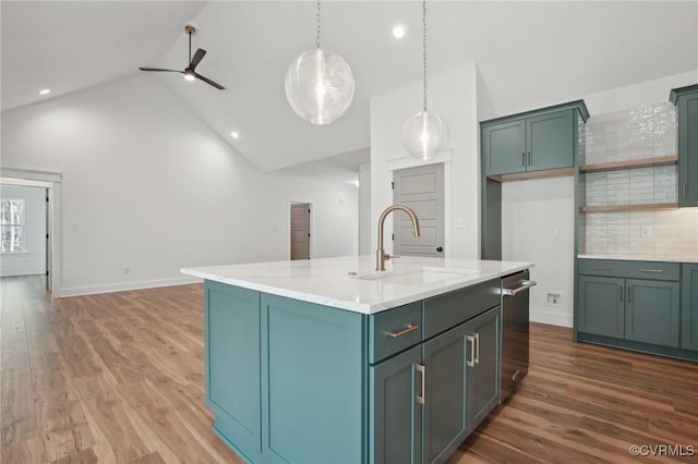 9088 Terroir Ln, New Kent, VA 23124 - kitchen featuring ceiling fan, tasteful backsplash, wood finished floors, a sink, and high vaulted ceiling