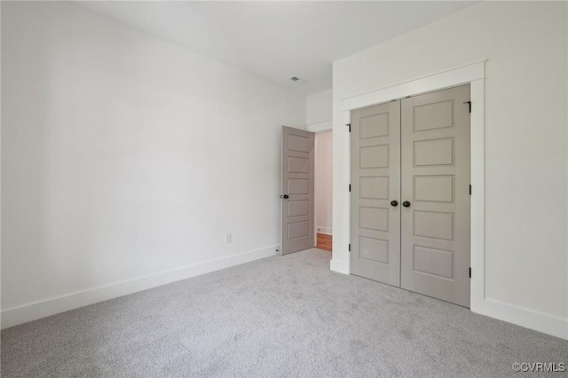 9088 Terroir Ln, New Kent, VA 23124 - unfurnished bedroom with carpet floors, baseboards, and a closet