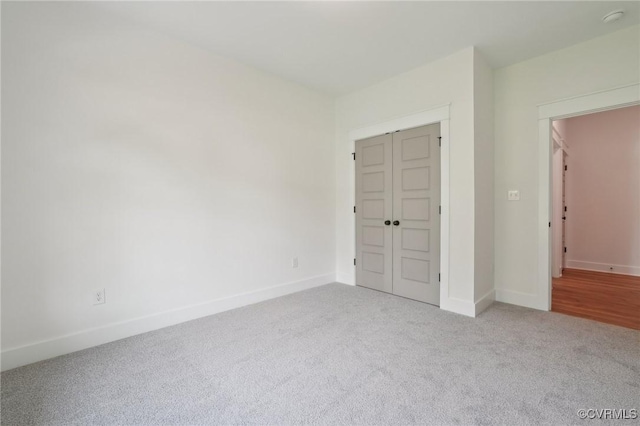 9088 Terroir Ln, New Kent, VA 23124 - unfurnished bedroom featuring baseboards, carpet, and a closet