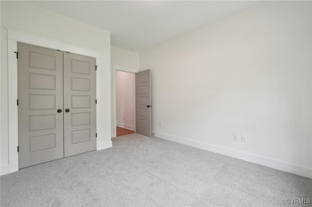 9088 Terroir Ln, New Kent, VA 23124 - unfurnished bedroom featuring carpet floors, baseboards, and a closet