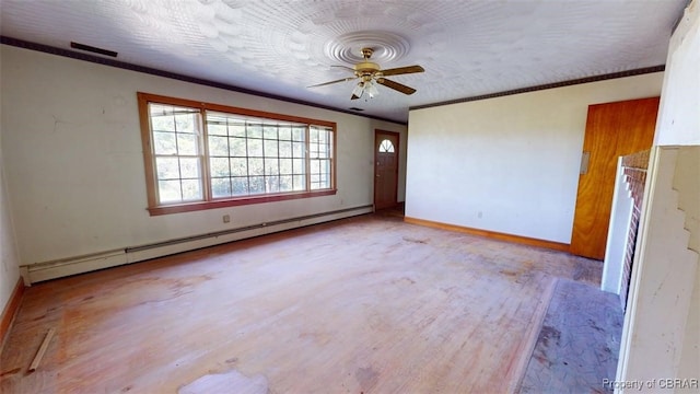 unfurnished room with a ceiling fan, ornamental molding, wood finished floors, baseboards, and a baseboard radiator