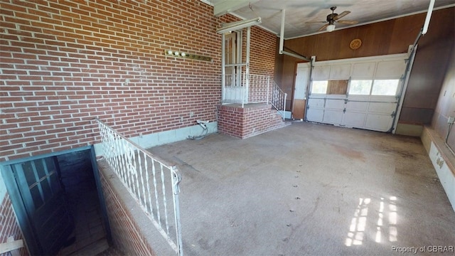 garage with a ceiling fan