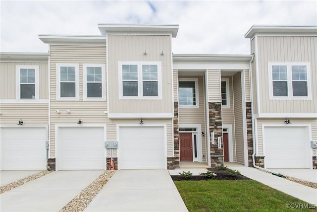 4118 Ebbies Xing, Midlothian, VA 23112 - multi unit property featuring a garage, board and batten siding, driveway, and stone siding