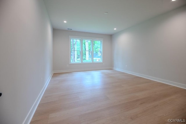 4629 Butte Rd, Richmond, VA 23235 - unfurnished room with light wood-style flooring, baseboards, and recessed lighting