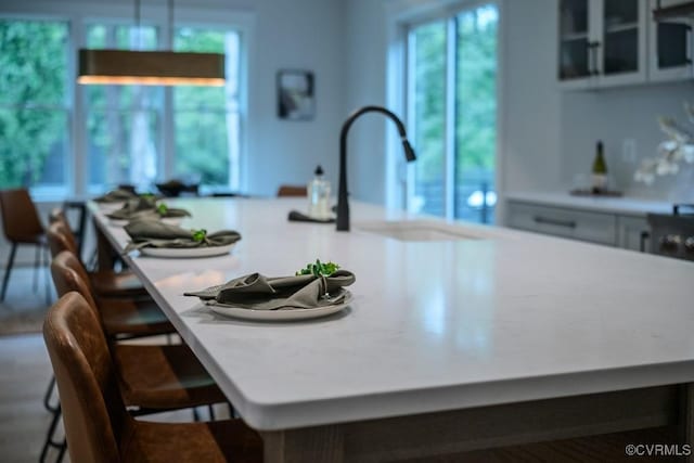 4629 Butte Rd, Richmond, VA 23235 - kitchen featuring plenty of natural light, light countertops, and a breakfast bar