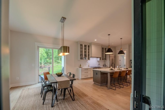 4629 Butte Rd, Richmond, VA 23235 - dining room featuring light wood finished floors, recessed lighting, and baseboards