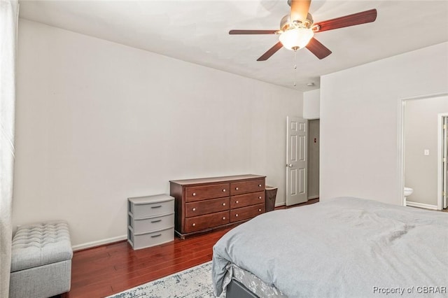 921 Hanson Dr, Newport News, VA 23602 - bedroom with baseboards, ensuite bathroom, a ceiling fan, and wood finished floors