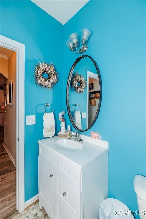 4716 Fulton St, Richmond, VA 23231 - bathroom featuring vanity, baseboards, and toilet