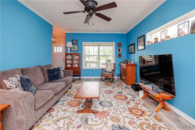 4716 Fulton St, Richmond, VA 23231 - living room featuring wood finished floors, crown molding, a ceiling fan, and baseboards
