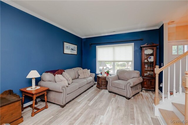 4716 Fulton St, Richmond, VA 23231 - living area featuring stairway, light wood-style floors, and ornamental molding