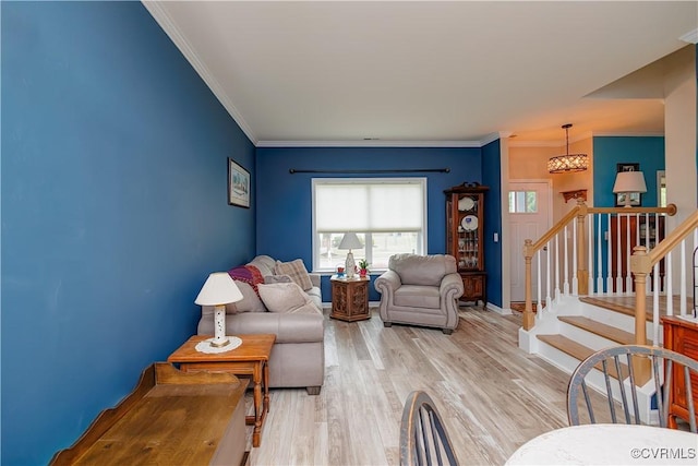 4716 Fulton St, Richmond, VA 23231 - living area featuring ornamental molding, light wood-style flooring, stairway, and baseboards