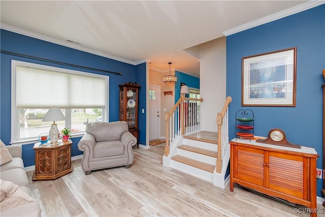 4716 Fulton St, Richmond, VA 23231 - living area featuring stairs, wood finished floors, ornamental molding, and baseboards