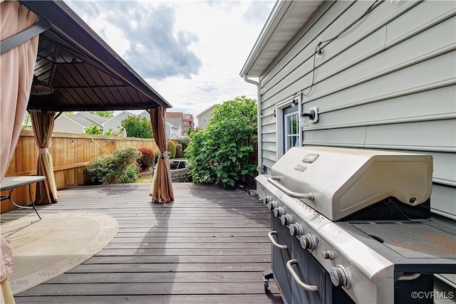 4716 Fulton St, Richmond, VA 23231 - deck featuring area for grilling, a gazebo, and fence