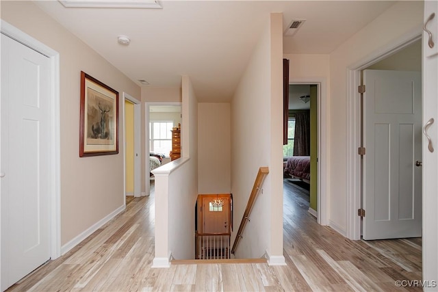 4716 Fulton St, Richmond, VA 23231 - corridor with an upstairs landing, light wood finished floors, and baseboards