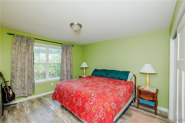 4716 Fulton St, Richmond, VA 23231 - bedroom featuring baseboards and wood finished floors