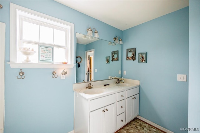 4716 Fulton St, Richmond, VA 23231 - full bathroom with double vanity and baseboards