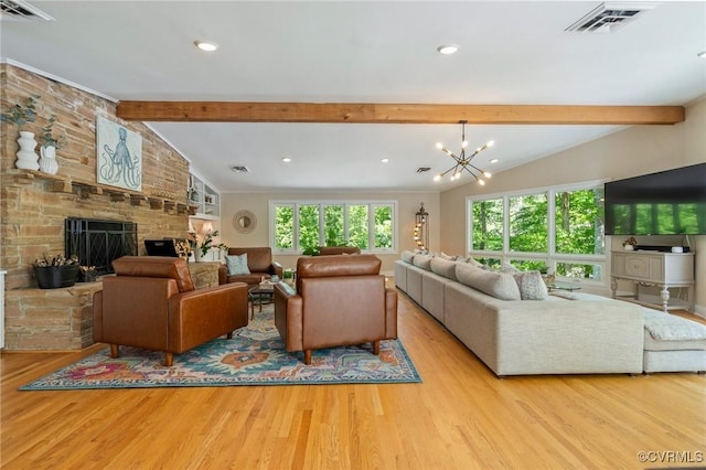 living area featuring vaulted ceiling with beams, a chandelier, wood finished floors, and visible vents