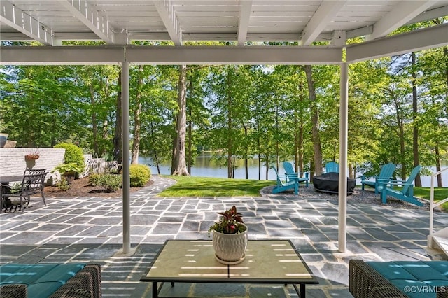 unfurnished sunroom with a water view