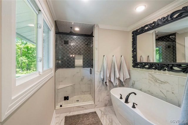 full bathroom featuring crown molding, a freestanding bath, a stall shower, marble finish floor, and recessed lighting