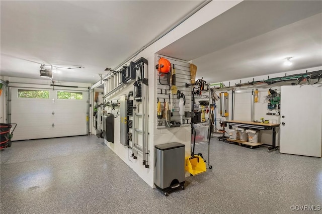 garage featuring a garage door opener