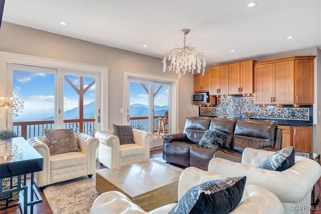 380 Blackrock Cir, Wintergreen, VA 22967 - living area featuring a chandelier, plenty of natural light, and recessed lighting