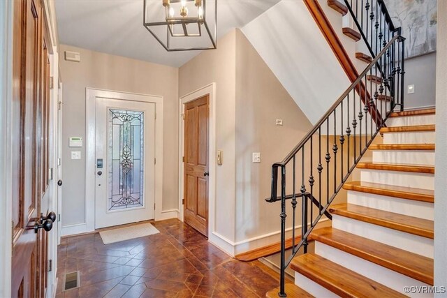 380 Blackrock Cir, Wintergreen, VA 22967 - foyer entrance with stairs and a chandelier