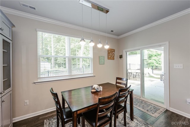 7585 Sedge Dr, New Kent, VA 23124 - dining room with dark wood-style flooring and ornamental molding