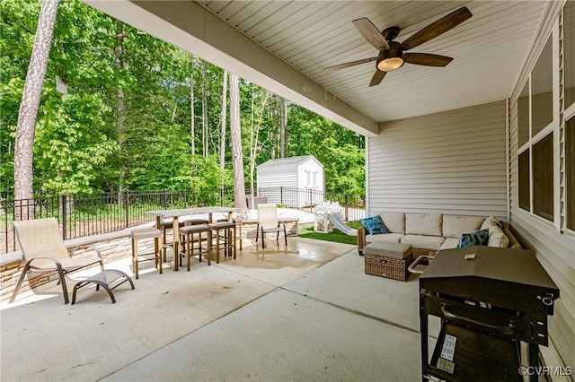 7585 Sedge Dr, New Kent, VA 23124 - fenced backyard featuring an outdoor hangout area, a patio area, a storage shed, a ceiling fan, and area for grilling