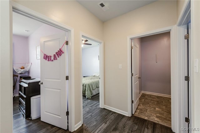7585 Sedge Dr, New Kent, VA 23124 - hall with dark wood-style floors and baseboards