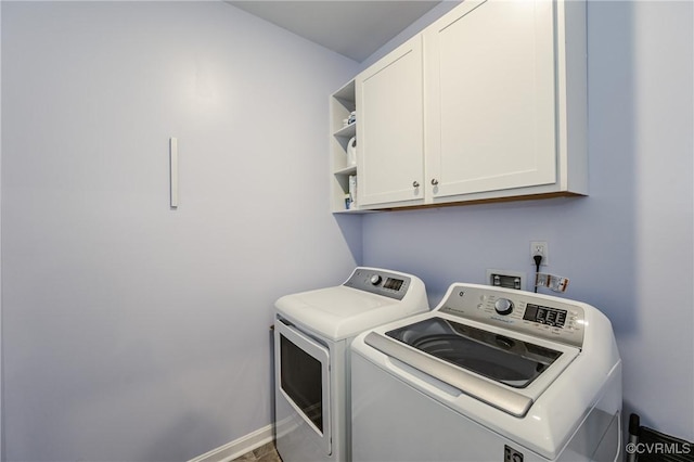 7585 Sedge Dr, New Kent, VA 23124 - laundry room with washing machine and dryer and cabinet space