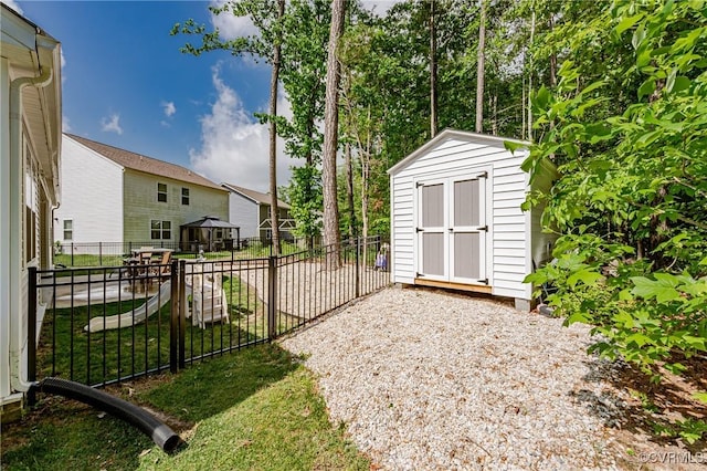 7585 Sedge Dr, New Kent, VA 23124 - fenced backyard featuring a storage shed and a gazebo