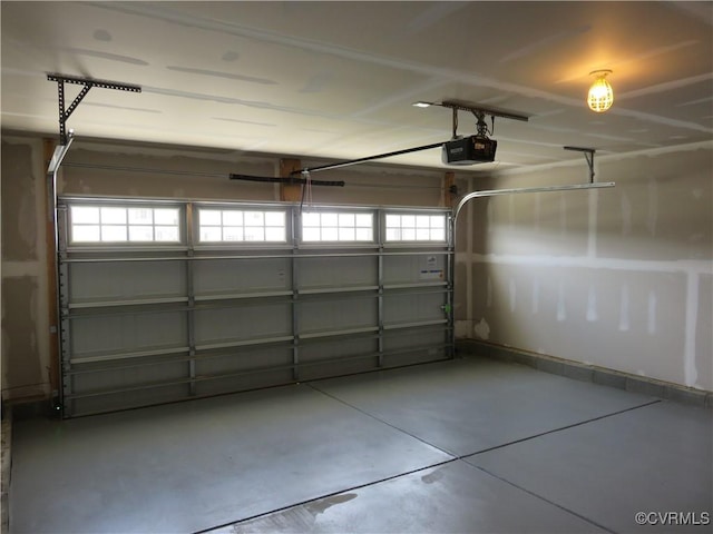 garage featuring a garage door opener
