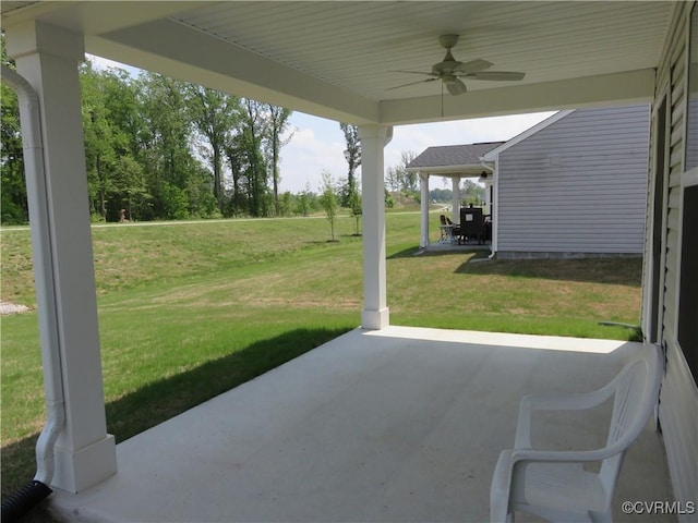 view of patio featuring a ceiling fan