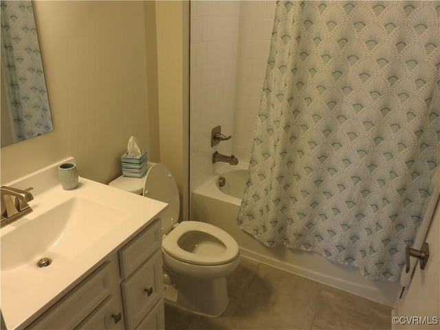 full bathroom with toilet, tile patterned floors, shower / bath combo, and vanity