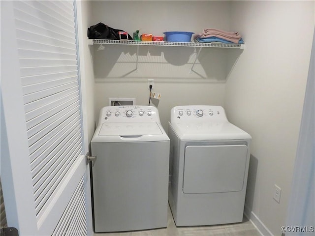 laundry room with laundry area and washer and dryer